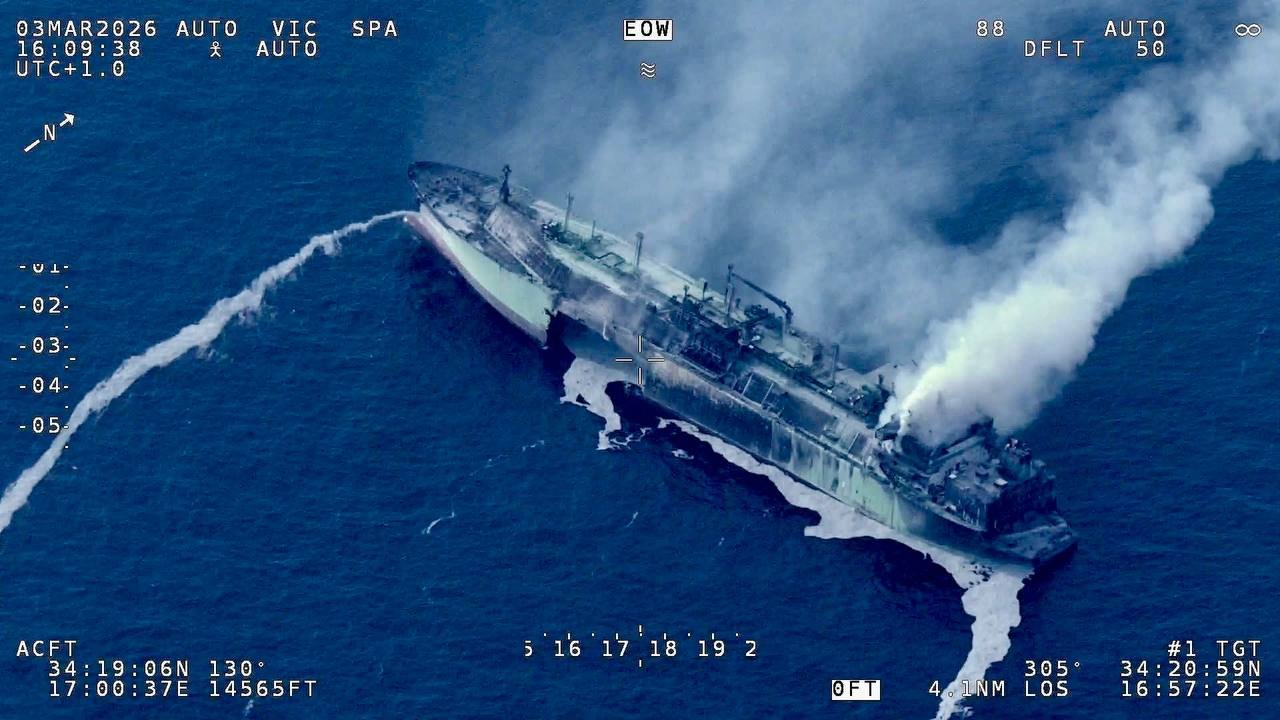 Aerial of Arctic Metagas on fire, 3 March 2026. Smoke from the after end; overlay in frame. Does not identify an attacker.